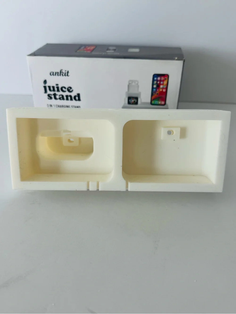 Brand new Ankit Juice Stand 3 in 1 charging dock silicone stand in white.
